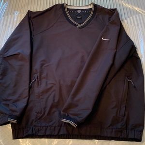 Men's size Medium Nike Golf V-neck wind shirt.